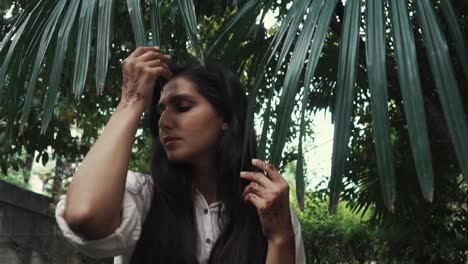 woman in a tropical garden