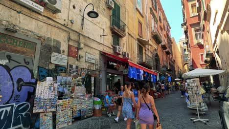 people exploring a vibrant street market in naples