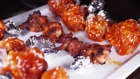 deliciously grilled chicken wings with sauce