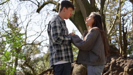 teenage couple in a park