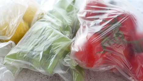 close up of fresh produce in plastic bags