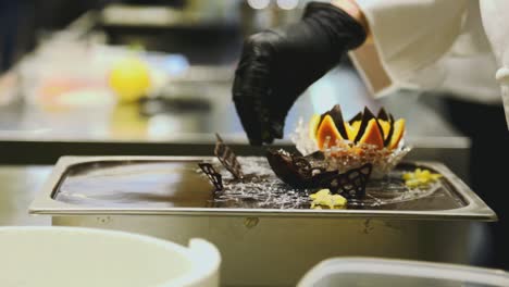 cooking gelato ice-cream from the side of center perspective with a part of making techniques and decoration