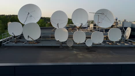 satellites dishes transmitting and receiving digital television broadcast signals