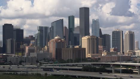 drone shot push in of downtown houston, texas on a cloudy day