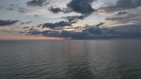 Sunrise-reverse-aerial-reveal-over-Rockport,-Texas