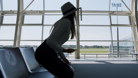 woman waiting at the airport