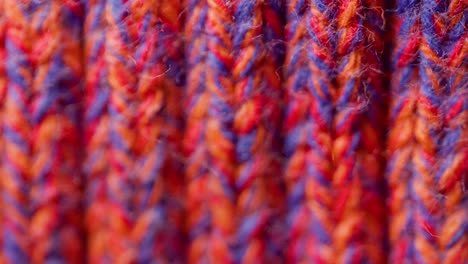 texture of a red knitted sweater