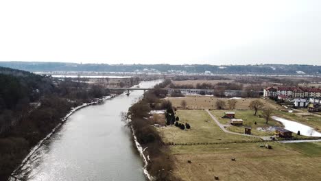 Beautiful-bridge-over-river-Nevezis-in-Raudondvaris,-Kaunas,-Lithuania