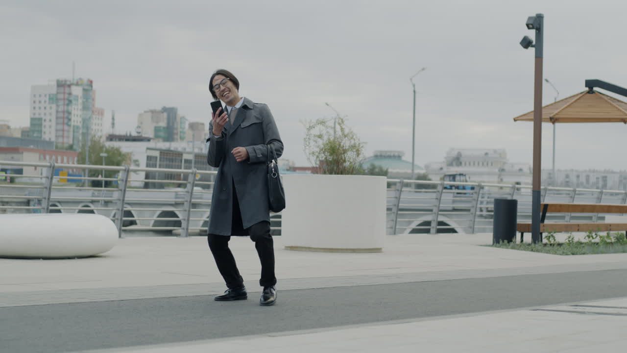 Happy Businessman Dancing in the City