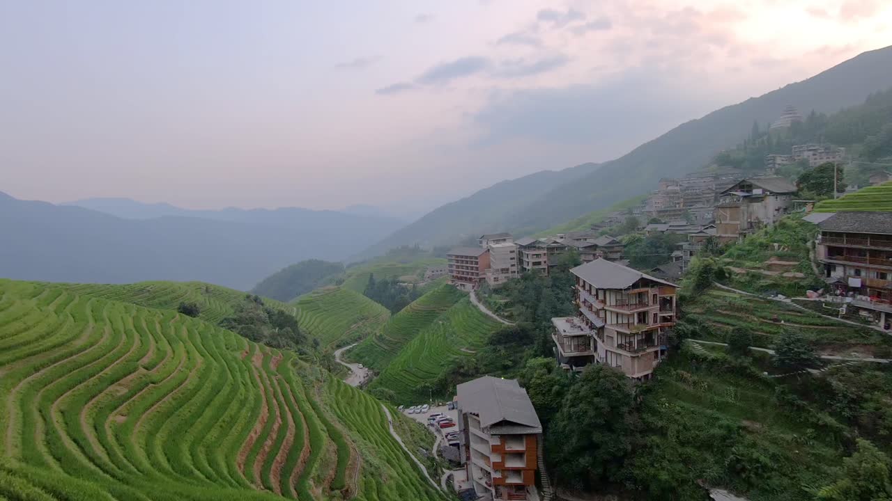 View of the beautifully located Pingan village, surrounded by scenic Rice terraces, northern Guilin, Guangxi Province, China