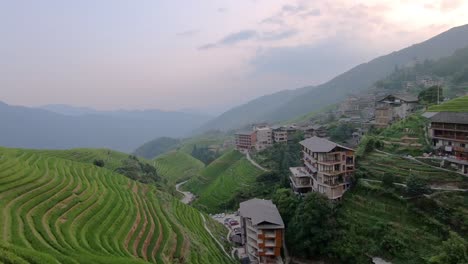 view of the beautifully located pingan village, surrounded by scenic rice terraces, northern guilin, guangxi province, china