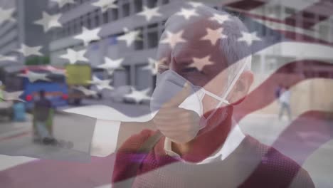 Animation-of-flag-of-usa-waving-over-caucasian-man-wearing-face-mask-in-city-street