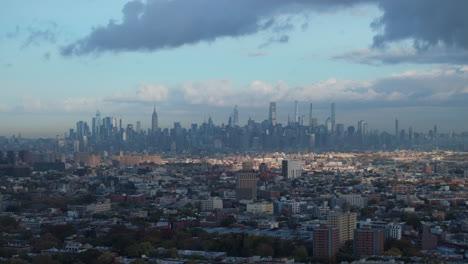 aerial view of the new york city skyline at sunrise