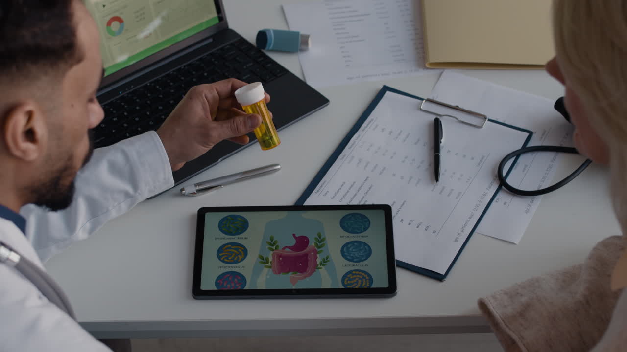 Doctor explaining gut health to patient