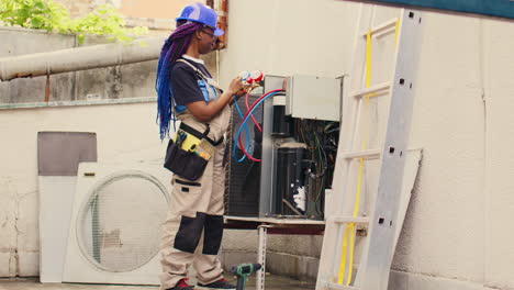 Mechanic-looking-at-refrigerant-levels