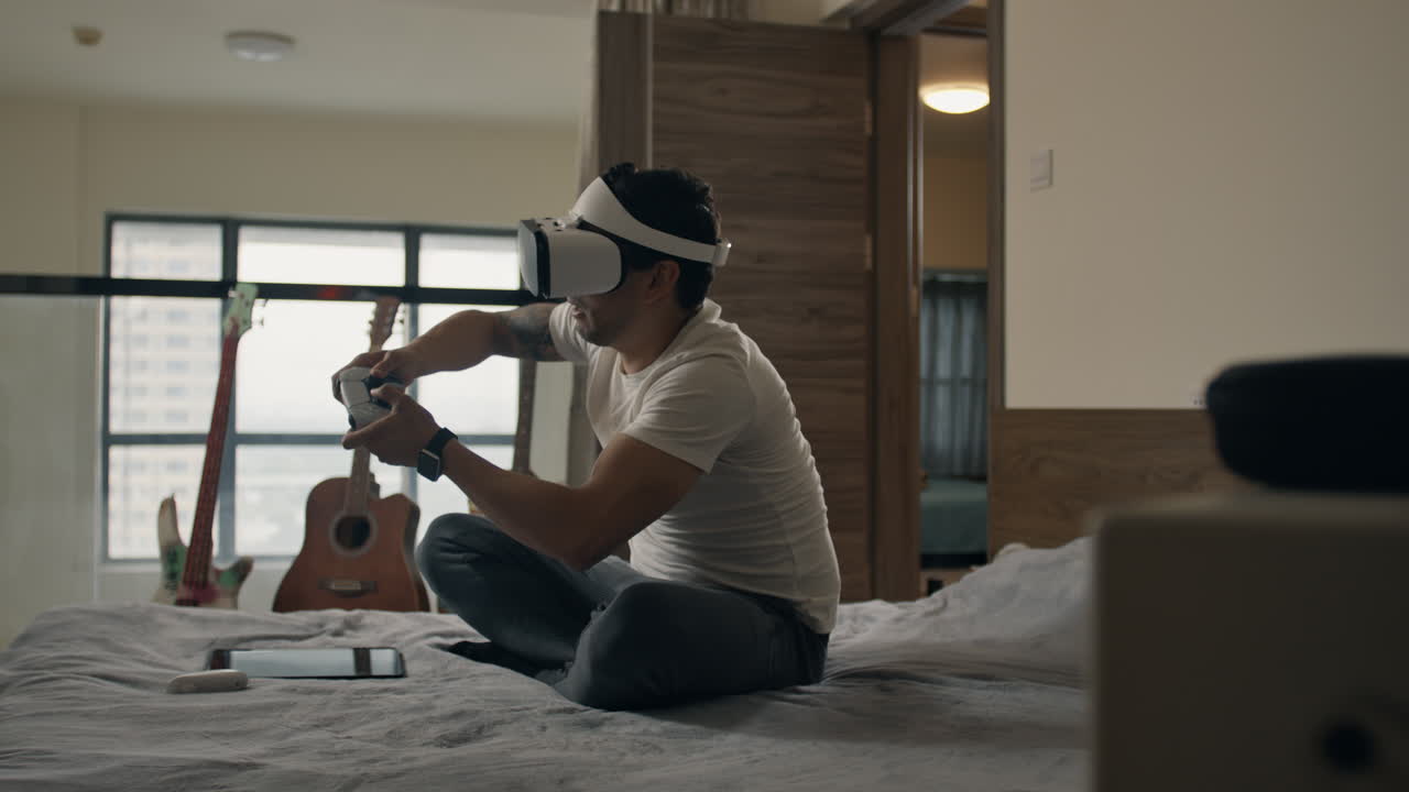 Man holds VR controller, focused on intense gaming in modern living room setup
