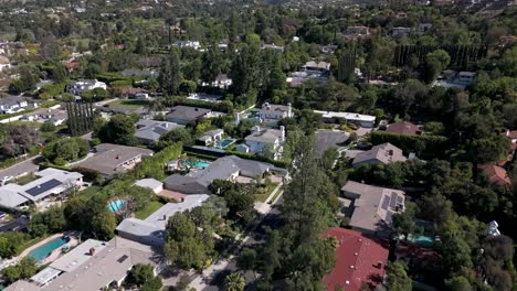 woodland hills and tarzana neighborhoods in san fernando valley of los angeles - aerial flyover of the residential area