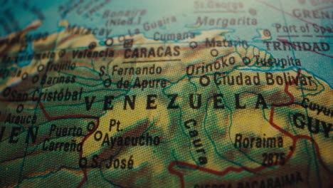close-up of a vintage world map focusing on venezuela