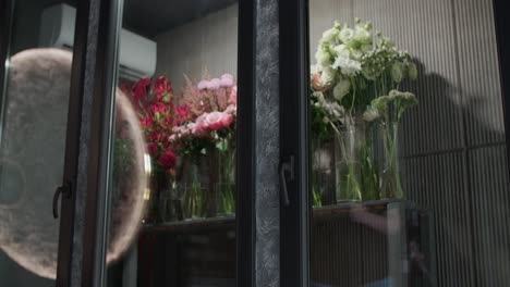 florist adjusting display windows