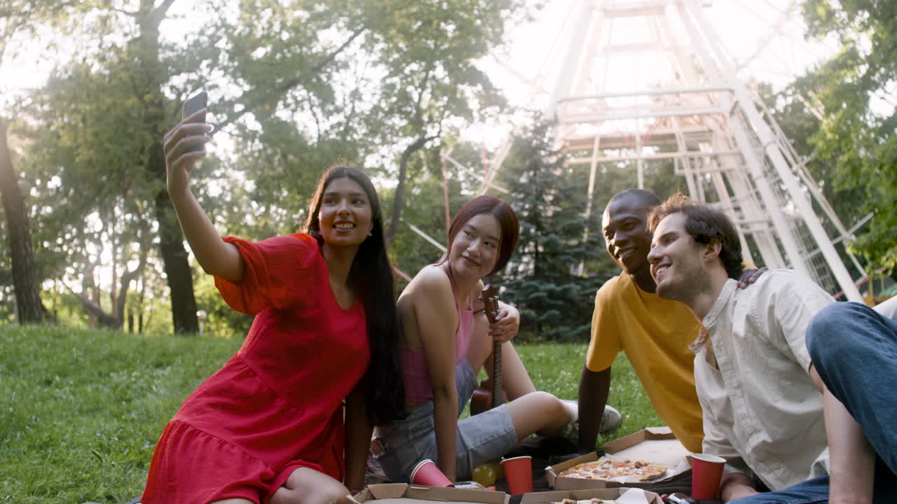 Four people taking photos