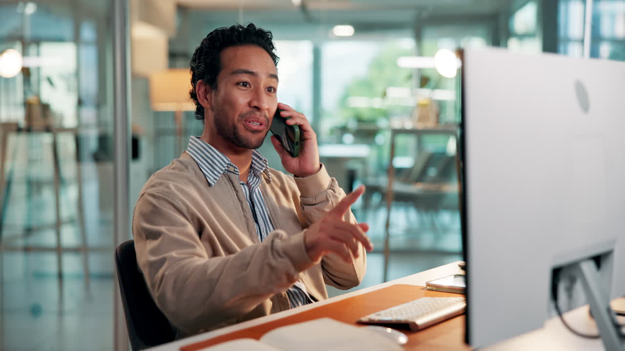 Smiling Businessman Making a Phone Call in Modern Office