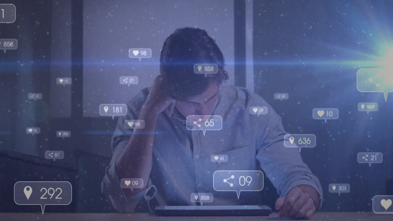 Using tablet with animation of social media notifications in dimly lit room