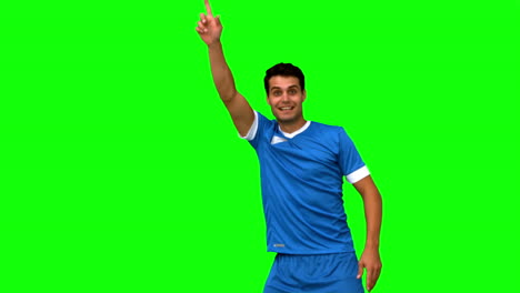 Verärgerter-Fußballspieler,-Der-Mit-Dem-Schiedsrichter-Auf-Dem-Greenscreen-Nicht-Einverstanden-Ist