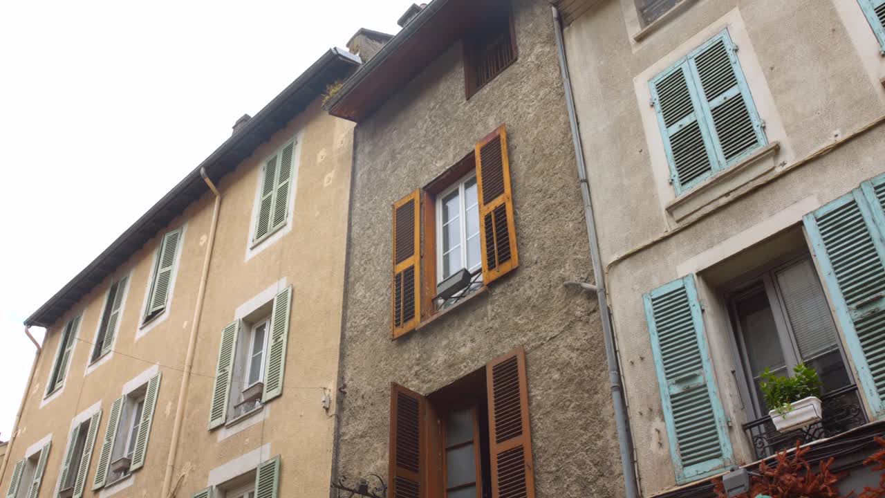 Charming Old Townhouses with Colorful Shutters