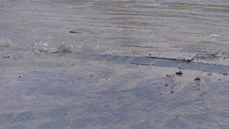 pipe burst on a public paving in 4k