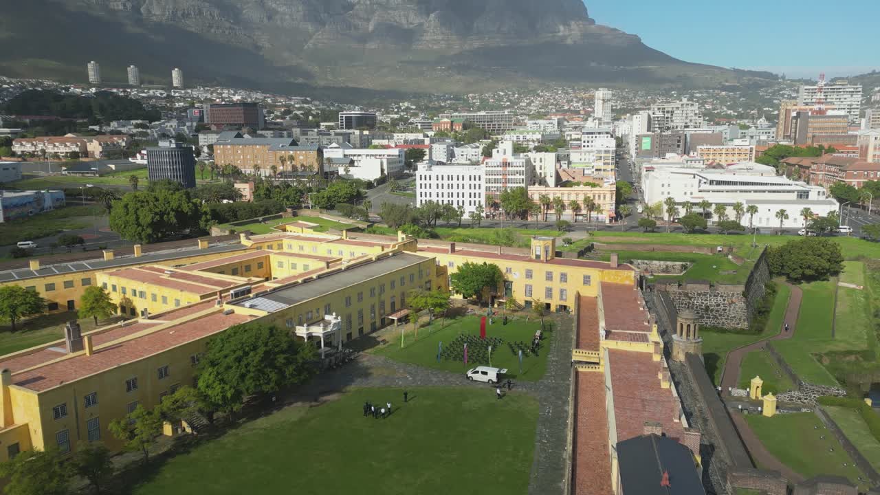 Cape Town with Castle of Good Hope and Table Mountain under a clear blue sky, aerial view