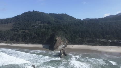 High-aerial-orbit-of-Lion-Rock-and-Arcadia-Beach-along-the-rugged-Oregon-coast