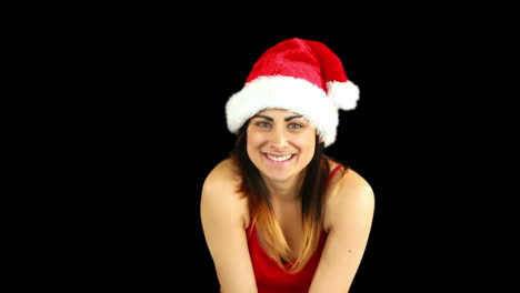 Festive-brunette-blowing-over-hands