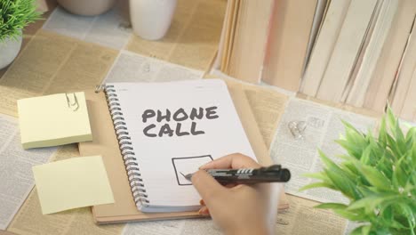 ticking off phone call work from checklist