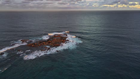 Wedding-Cake-Island-During-Cloudy-Weather-At-Sunset-In-NSW,-Australia
