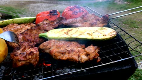 human hands prepares a pickled tasty pork or beef meat and vegetables.