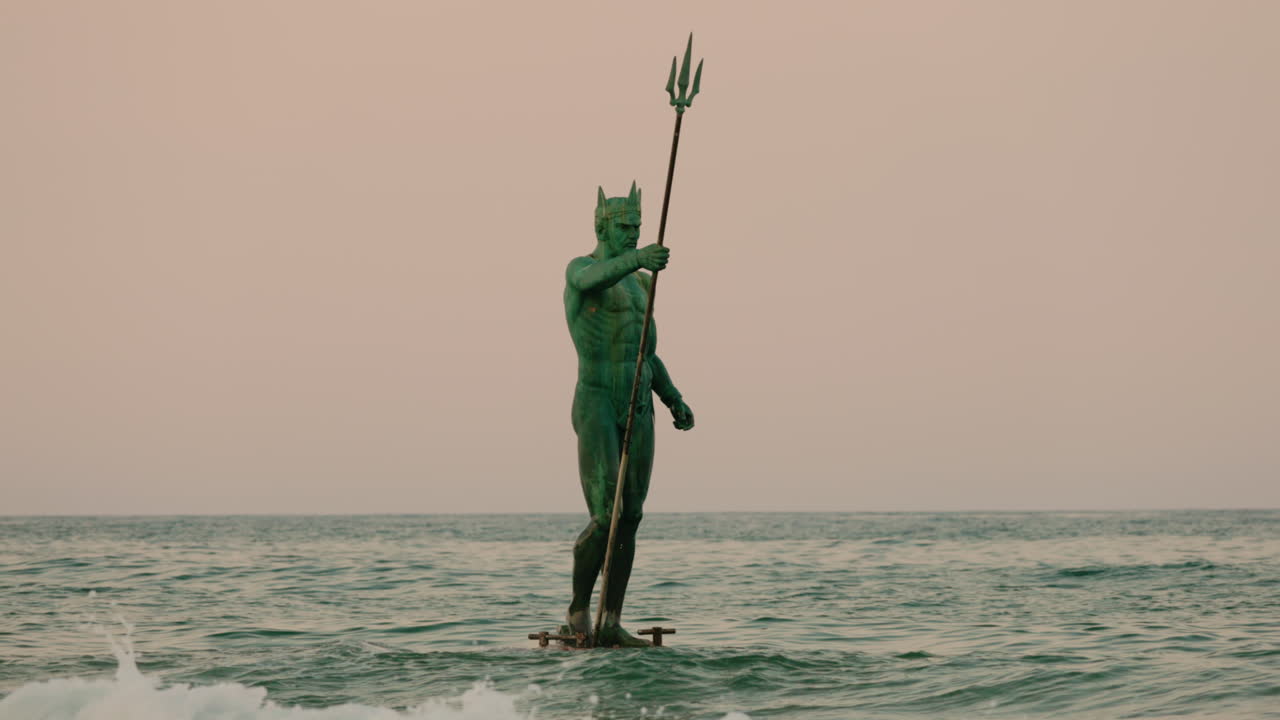 Statue of Poseidon in the Ocean