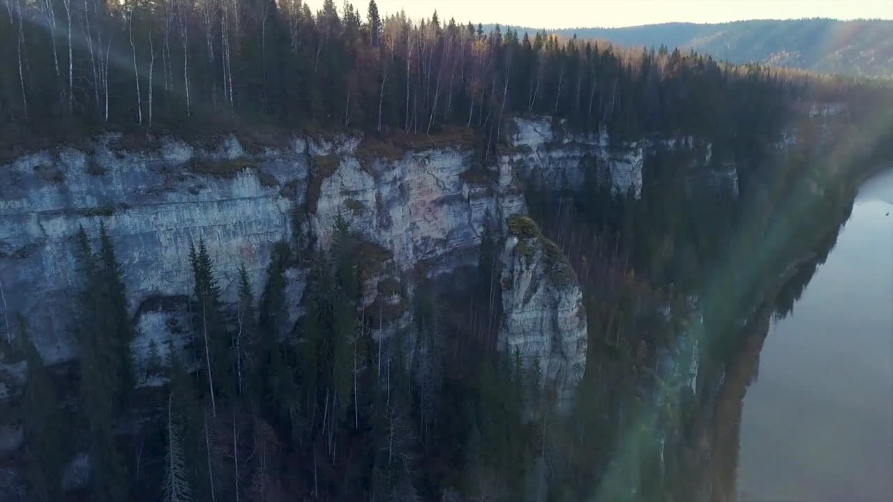 Aerial View of a Canyon with Cliffs and River