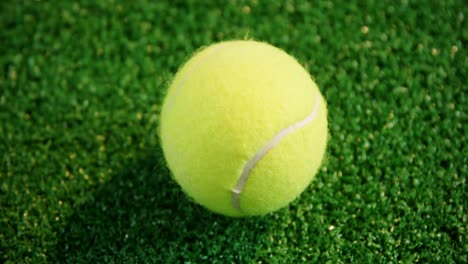 Close-up-of-tennis-balls-on-grass-4k