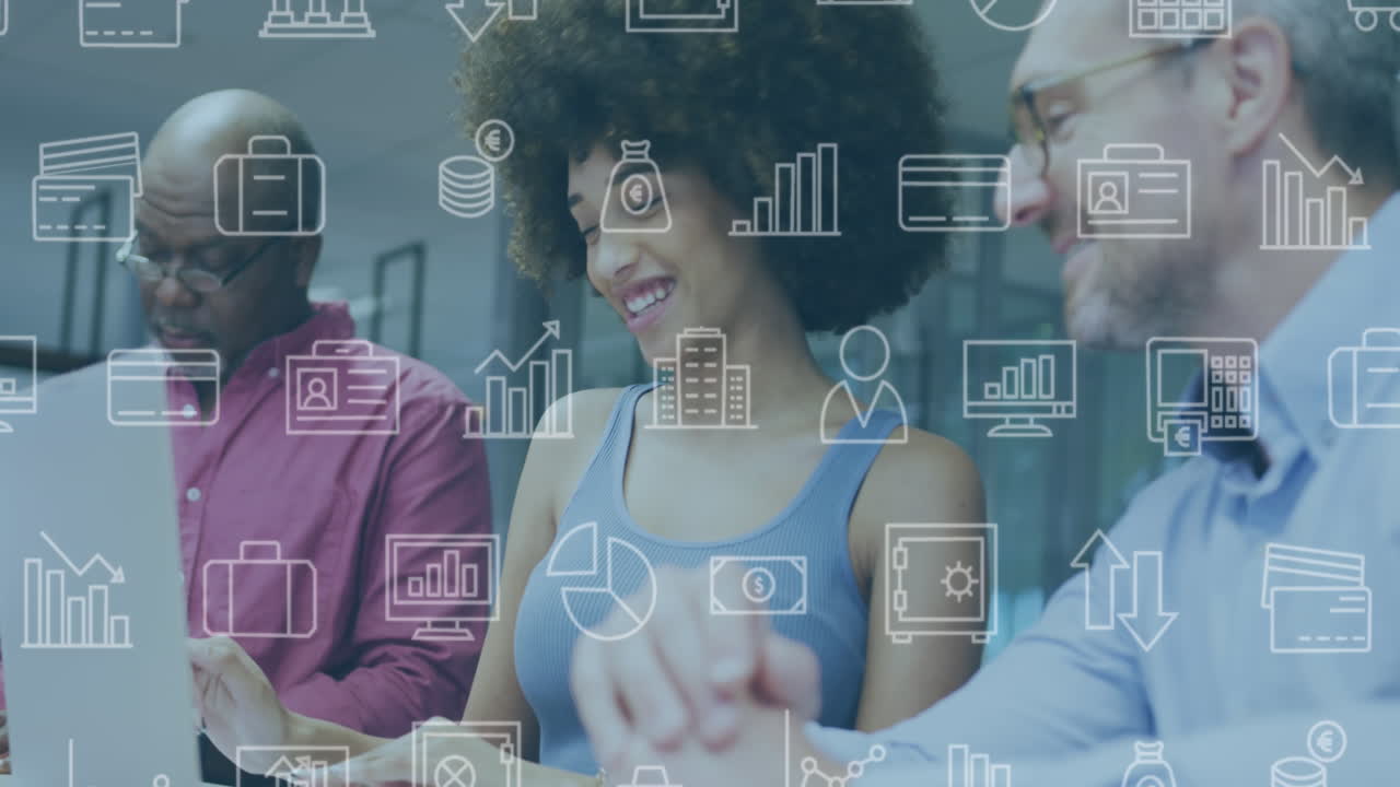 Animation of multiple icons over diverse smiling coworkers discussing over laptop in office