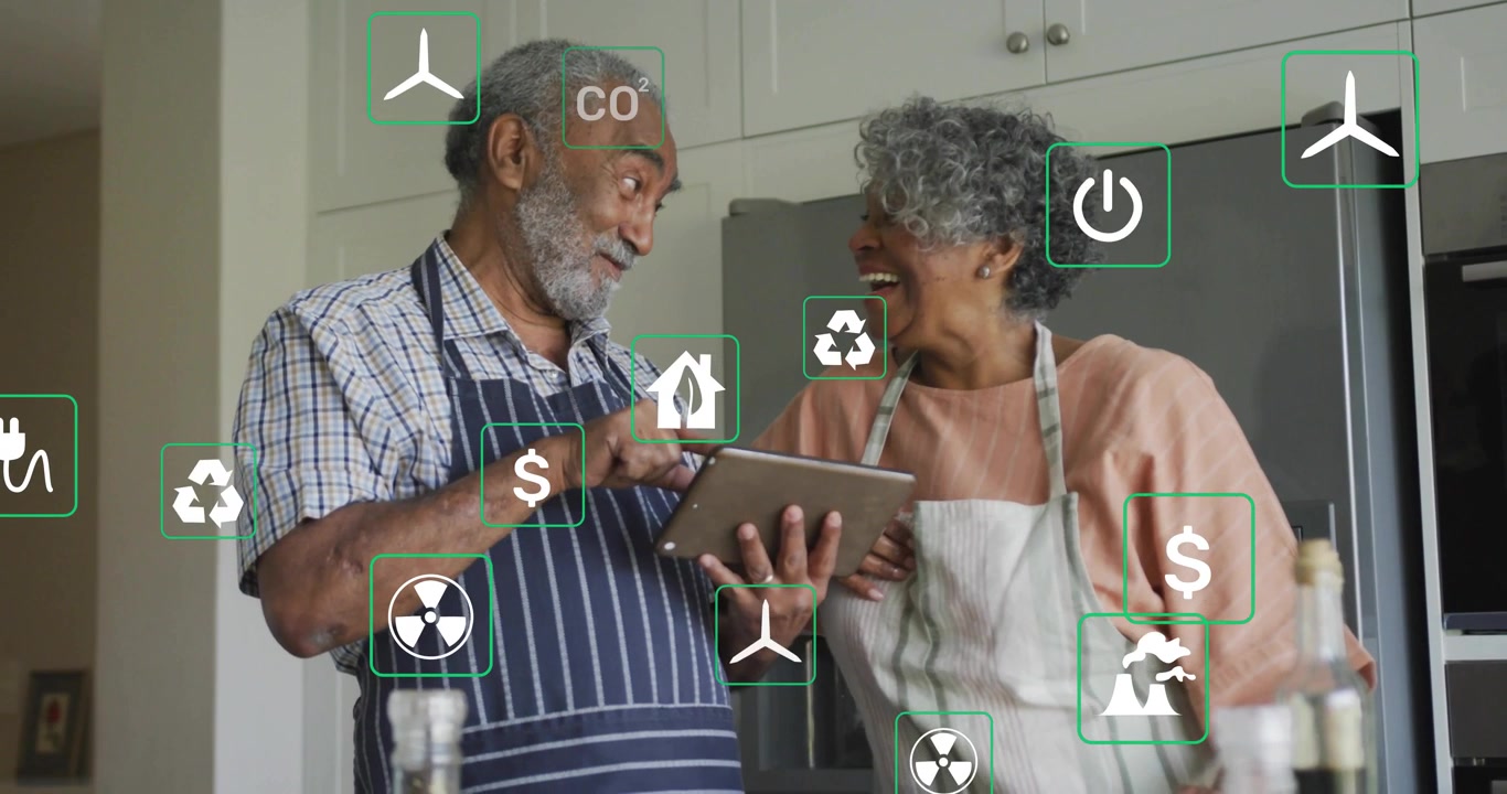 Video vertical: Hombre con delantal tocando, mujer apoyada en la cocina, viendo opciones de energía en una tablet