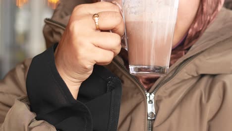 woman drinking hot chocolate