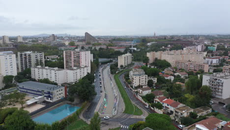 Heavy-rain-Montpellier-aerial-shot-of-Verdanson-and-Lez-river-France-cloudy-day