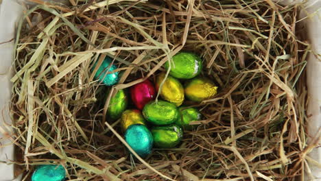 Easter-eggs-packed-falling-in-the-straw