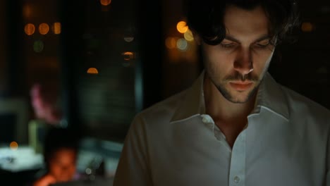 male executive using digital tablet in office 4k
