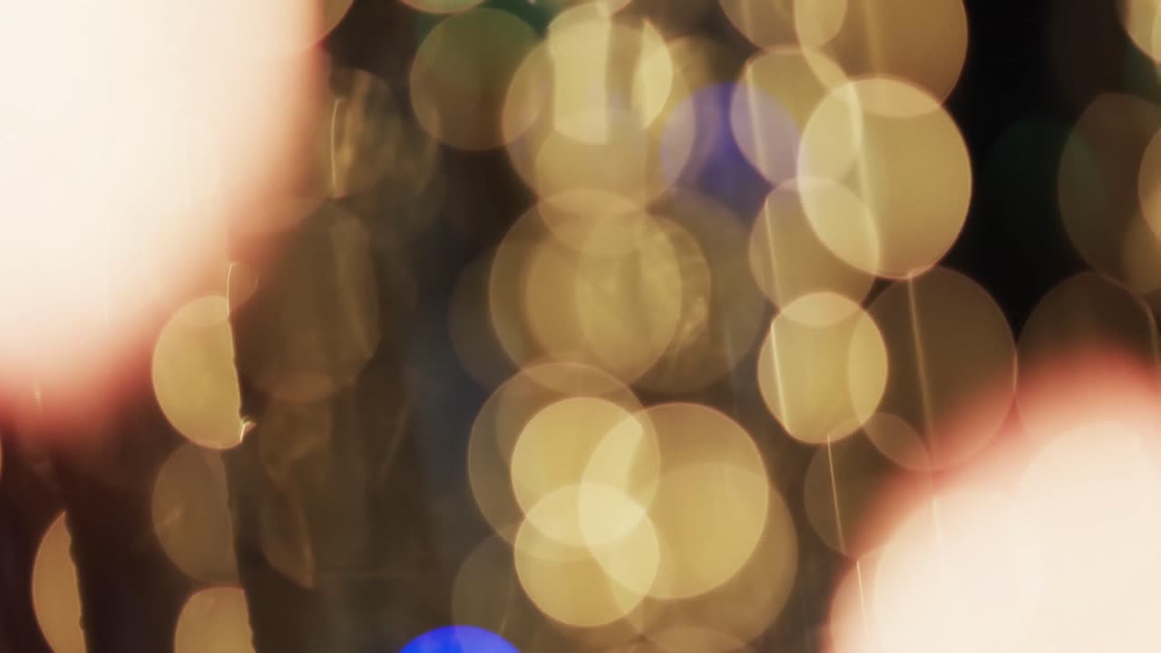 video de puntos de luz bokeh amarillos parpadeantes con espacio de copia