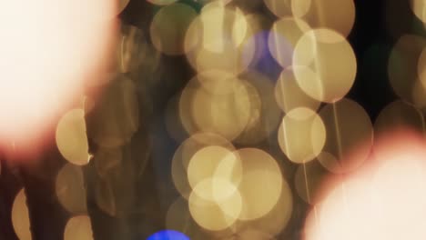 Video-of-flickering-yellow-bokeh-spots-of-light-with-copy-space