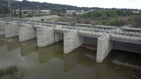 Rear-flyover-of-San-Gabriel-Valley-riverbed-and-concrete-dam