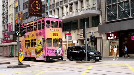 vibrant trams and taxis in urban hong kong