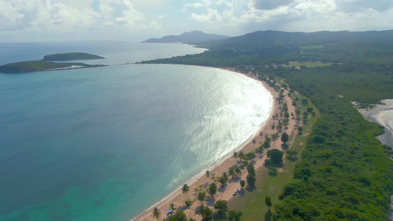 Aerial View Of Sun Bay Beach On Sunny Summer Day In Vieques, Puerto Rico. panning ascend