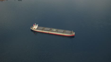 Freight-Barge-Floating-In-The-Sea-Near-The-Port